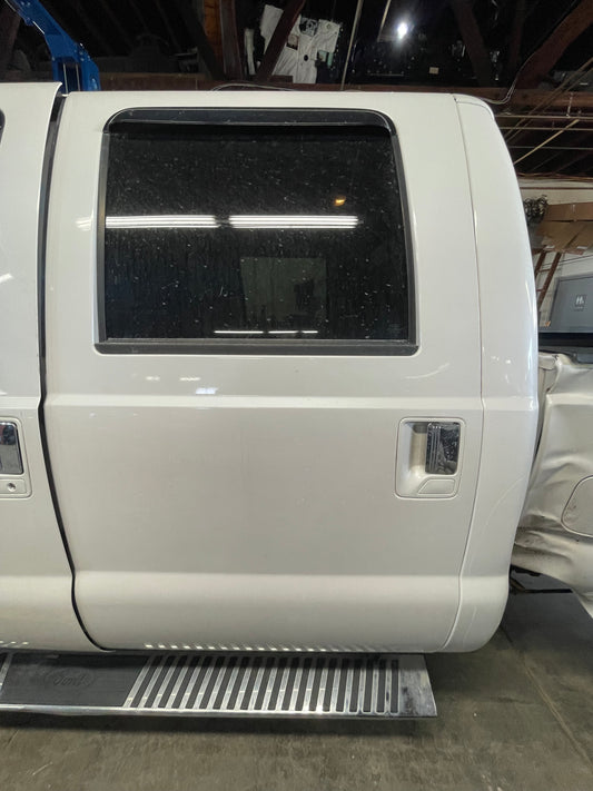 2011-2016 Superduty LH rear door pearl white UG #1063