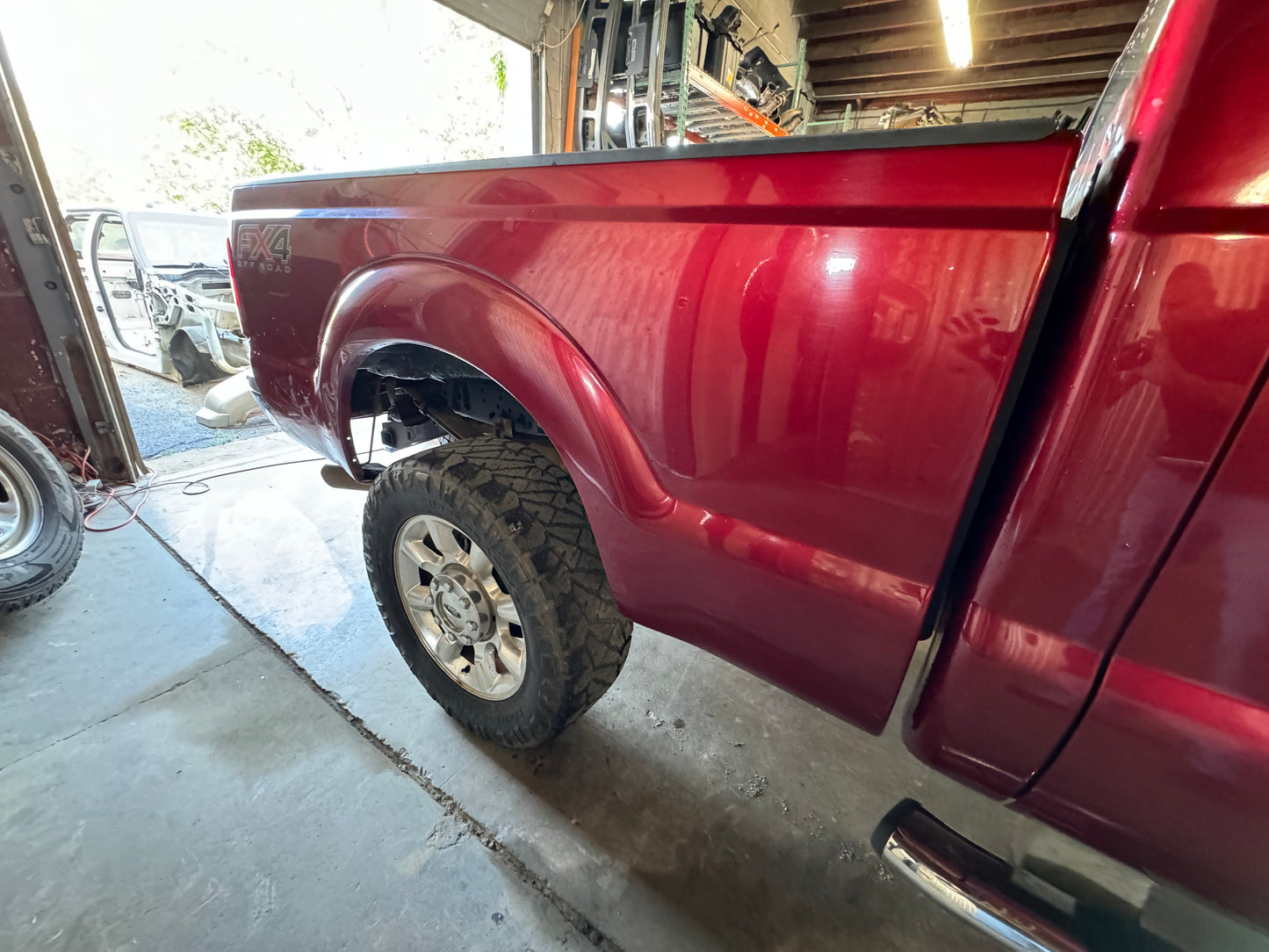 11-16 Superduty Short bed 6’9” Ruby Red #1076