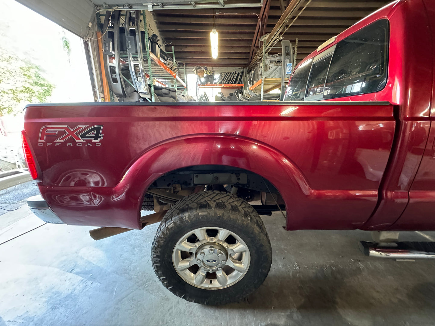 11-16 Superduty Short bed 6’9” Ruby Red #1076